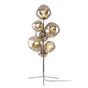 Lava Cone floor lamp with a tapered metallic cone in chrome finish