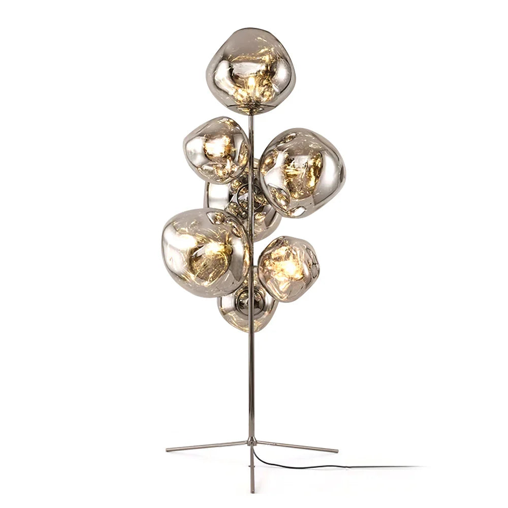 Lava Cone floor lamp with a tapered metallic cone in chrome finish