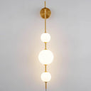 Vertical Globe Plug In Wall Lamp